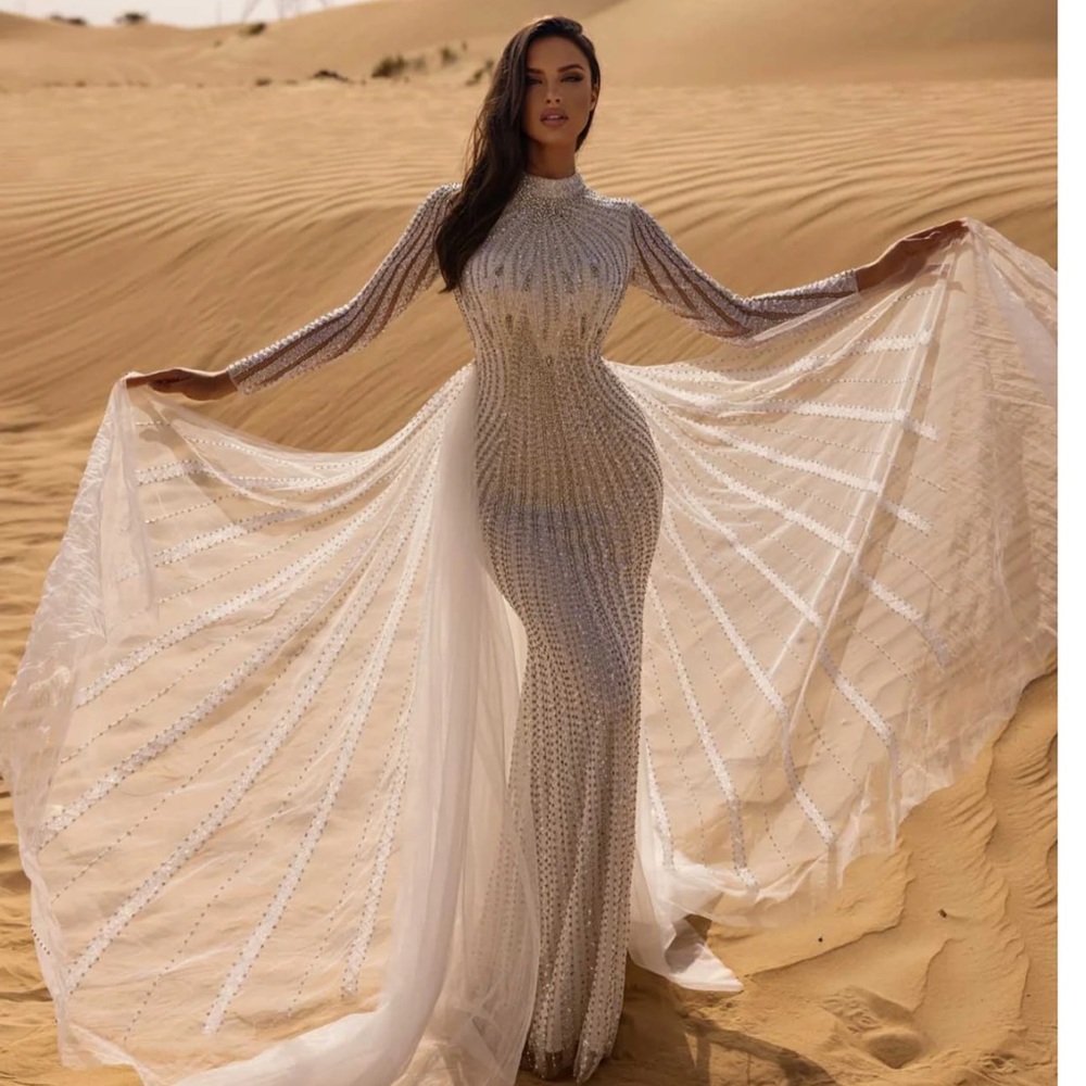 Elegant White Gown with Sheer Cape